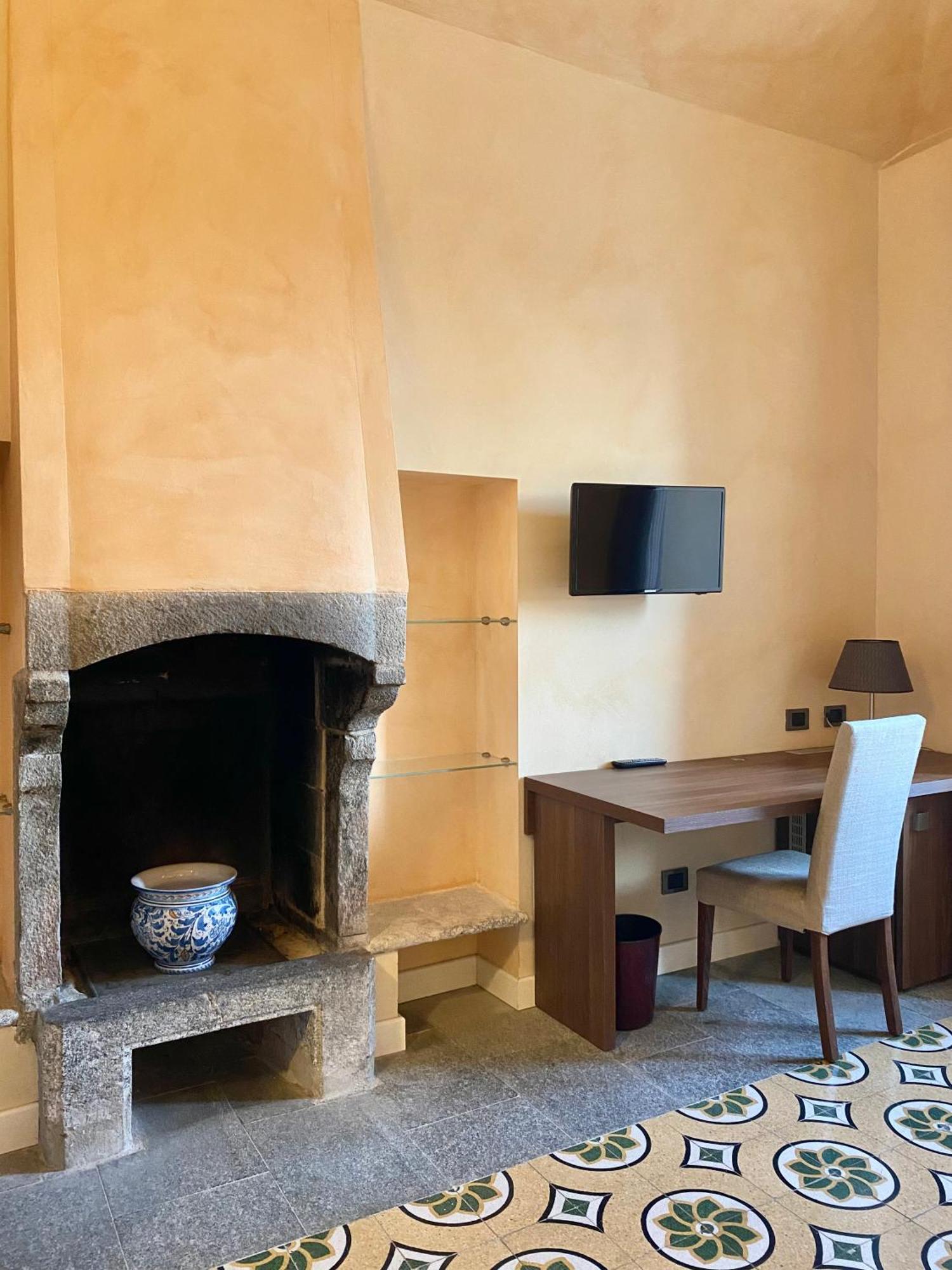 Relais & Spa Castello Di Casiglio Ерба Номер фото
