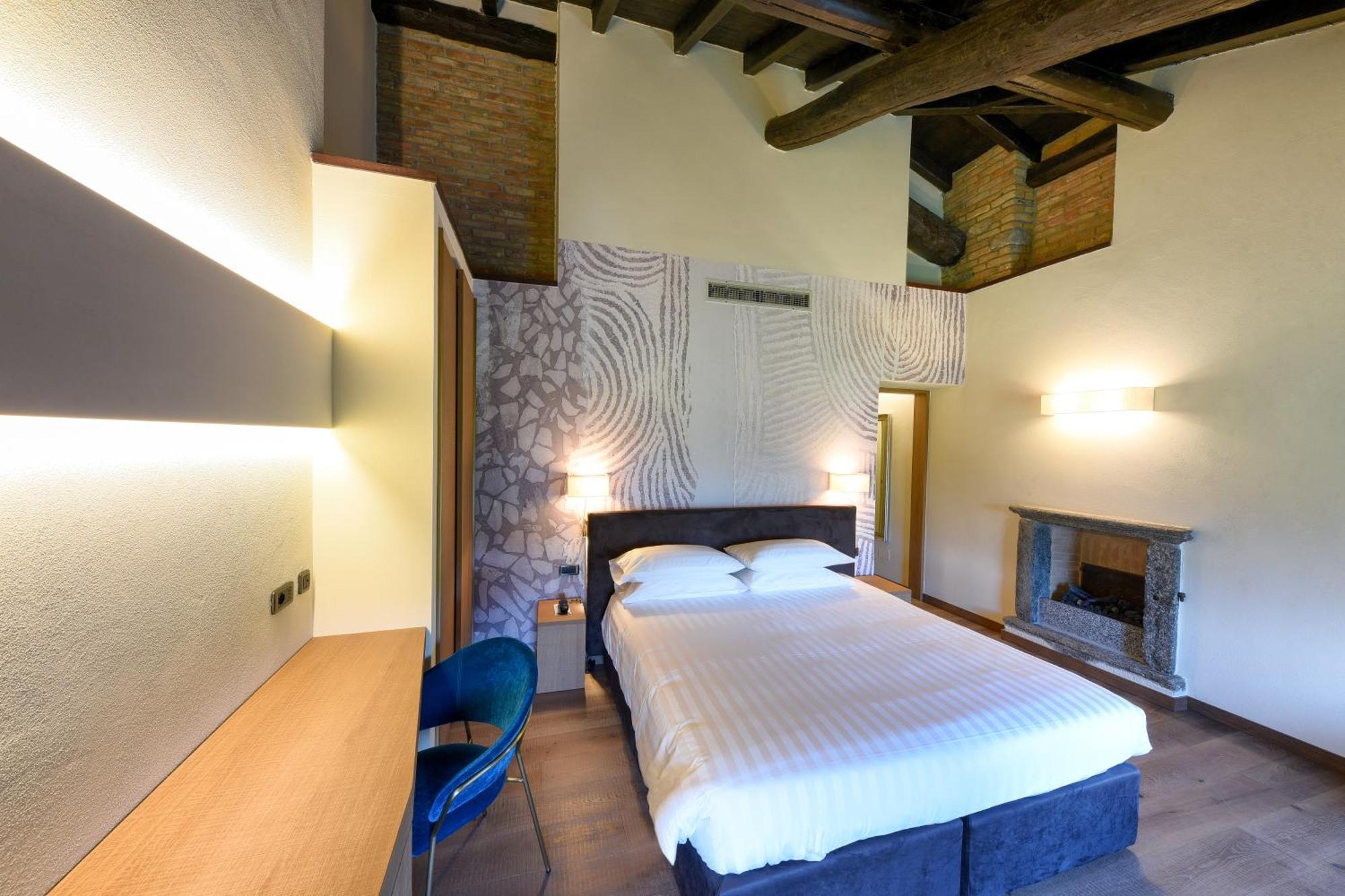 Relais & Spa Castello Di Casiglio Ерба Номер фото